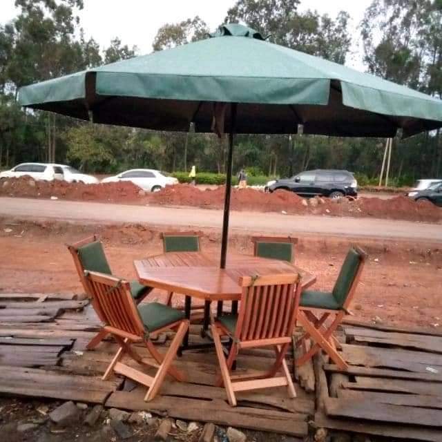 Umbrella tent with two benches.