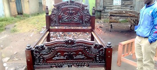 King bed, 5×6 mahogany hardwood,  professionally mounted with great designs.