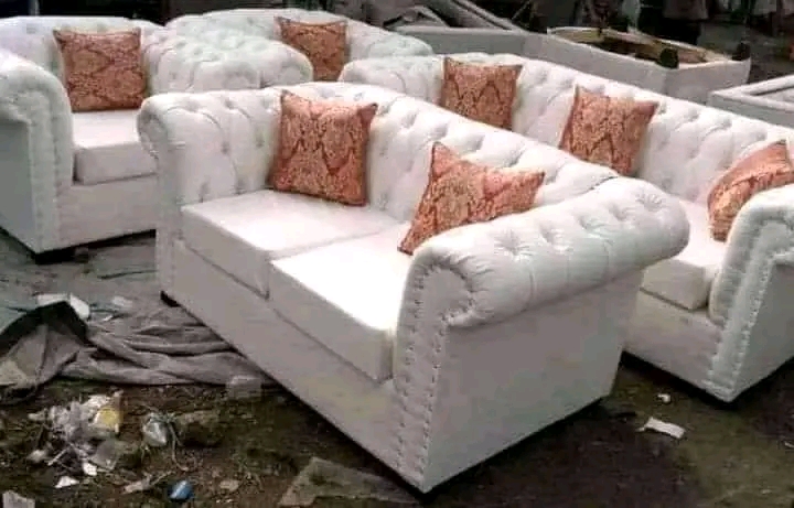 Button sofa set 7 seater with ottoman.