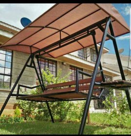 Swing bench with a removable shade.